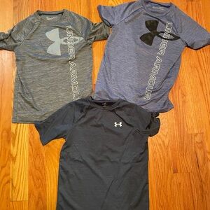 Three Under Armour Kids' Charcoal, Heather Blue/Purple and Dark Gray Tees